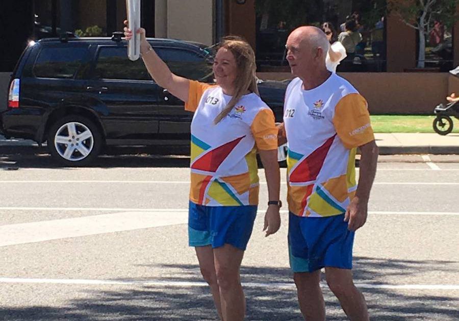 Donna Johnson, Teacher Assistant at Mater Christi Catholic Primary School, participating in the Queen's Baton Relay for the 2018 Commonwealth Games